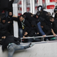 Illustration for article titled Photos: French Soccer Fans Brawl With Riot Police